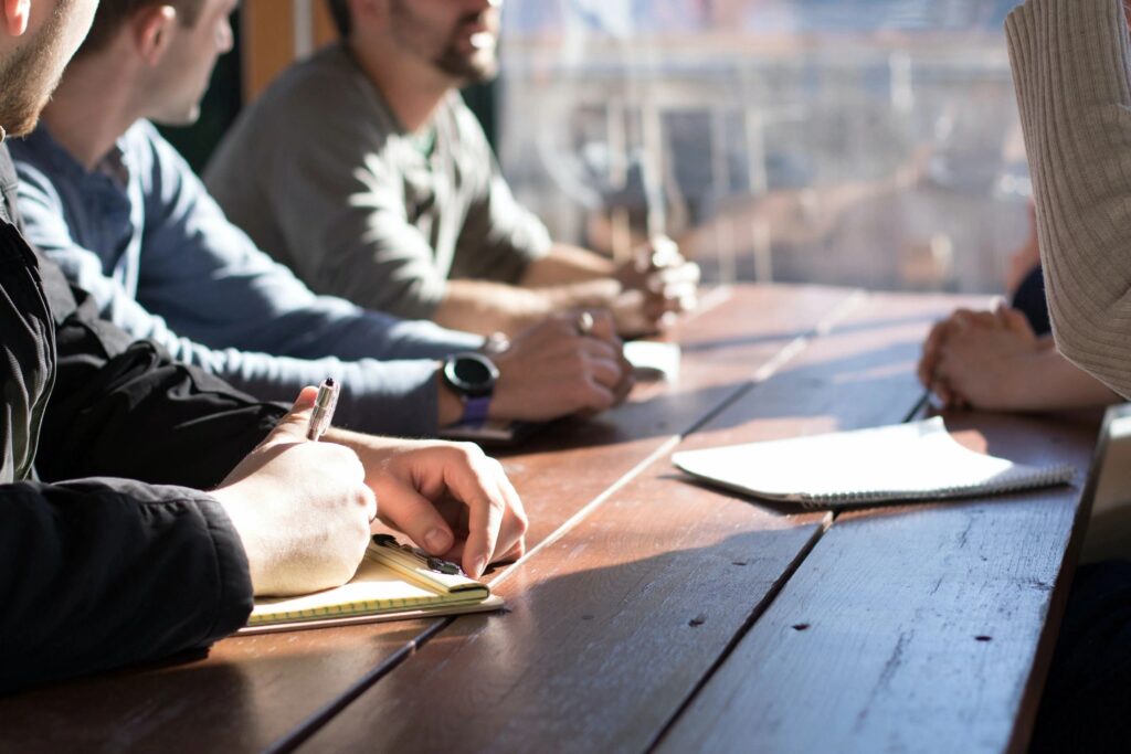 People working at a table 